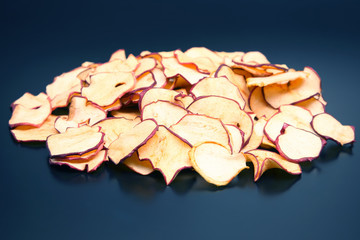 Dried Apple slices on dark background