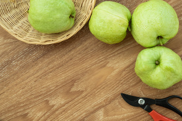 Fresh organic guava fruit. on wooden background.