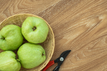 Fresh organic guava fruit. on wooden background.