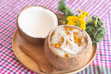 GLUTINOUS RICE ROASTED IN COCONUT or Sticky rice soaked in coconut milk