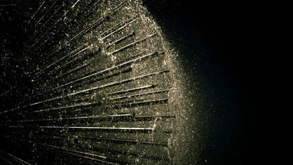 Beautiful fountain with the rhythm of the jets and with a fountain in the form of a ball in black...