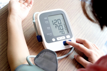 Human check blood pressure monitor and heart rate monitor with digital pressure gauge. Health care...