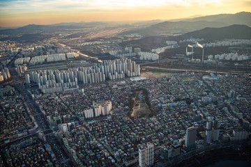Aerial view cityscape of Seoul, South Korea. Aerial View Lotte tower at Jamsil. View of Seoul with river and mountain. Seoul downtown city skyline, Aerial view of Seoul