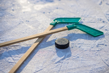 ice hockey stick. team game, competition concept in business.Ice hockey sticks and puck on isolated...