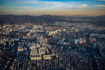 Aerial view cityscape of Seoul, South Korea. Aerial View Lotte tower at Jamsil. View of Seoul with river and mountain. Seoul downtown city skyline, Aerial view of Seoul
