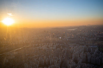 Aerial view cityscape of Seoul, South Korea. Aerial View Lotte tower at Jamsil. View of Seoul with river and mountain. Seoul downtown city skyline, Aerial view of Seoul