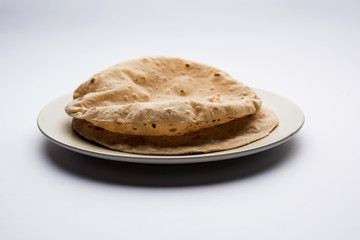 Chapati / Tava Roti also known as Indian bread or Fulka/phulka. Main ingredient of lunch/dinner in India/Pakistan. selective focus