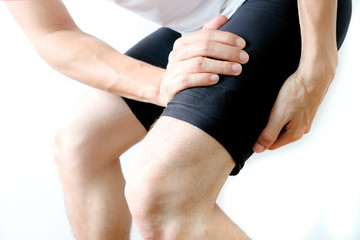 Leg muscle pain.young man  and grasped his muscles. With foot pain and stretching, fatigue muscles...