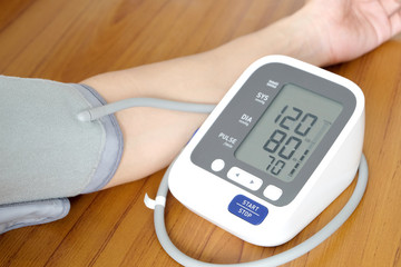 Human check blood pressure monitor and heart rate monitor with digital pressure gauge. Health care...