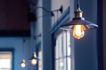 Decorate a vintage style home with modern hanging lamps.