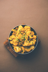Dry Gobi Masala/ cauliflower Sabzi served in a bowl. selective focus