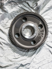 A beautiful effect on the gears in the process of nitriding to obtain a solid surface layer of metal.