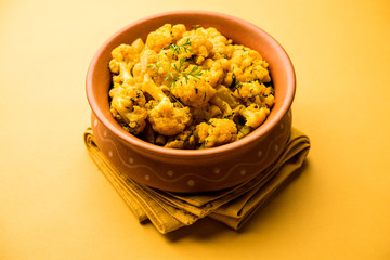 Dry Gobi Masala/ cauliflower Sabzi served in a bowl. selective focus