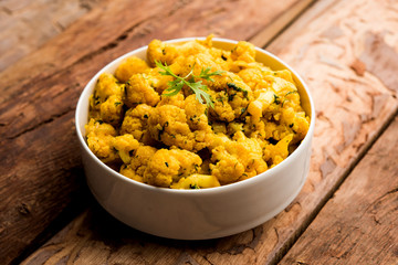 Dry Gobi Masala/ cauliflower Sabzi served in a bowl. selective focus