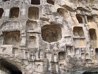 Luoyang Longmen grottoes. Broken Buddha and the stone caves and sculptures in the Longmen Grottoes in Luoyang, China. Taken in 14th October 2018