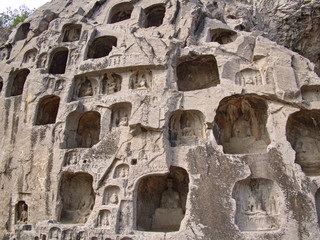 Luoyang Longmen grottoes. Broken Buddha and the stone caves and sculptures in the Longmen Grottoes in Luoyang, China. Taken in 14th October 2018