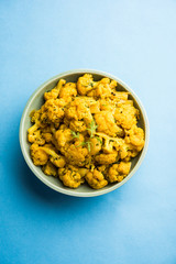 Dry Gobi Masala/ cauliflower Sabzi served in a bowl. selective focus