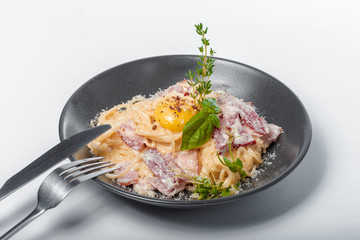 Delicious spaghetti pasta cook with crispy bacon serve