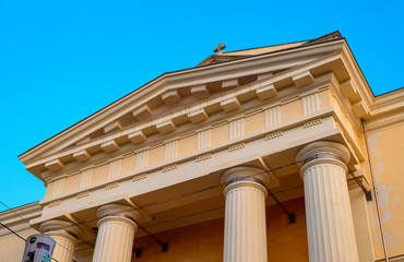 Fototapeta premium Alghero, Sardinia, Italy - Facade of Alghero Cathedral church, known also as Cathedral of St. Mary the Immaculate - Duomo di Alghero - at the Piazza Duomo square in the historic quarter of Alghero