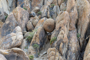 A boulder suspended between rocks in the Alabama Hills near Lone Pine, California, USA