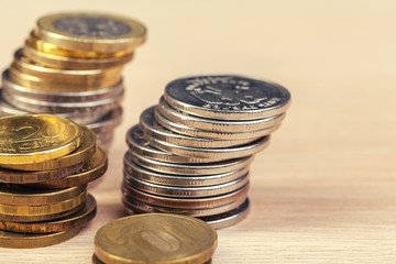 piles of coins on working table