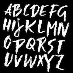 Chalk textured font. Grunge script on chalkboard. Vector calligraphy illustration.