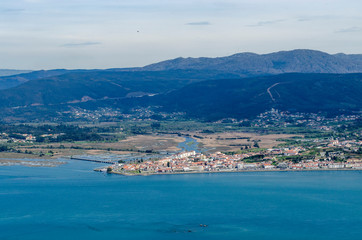 Fototapeta premium View of the Portuguese village of Caminha from the Santa Tecla hill in Galicia