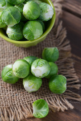 cabbage sprouts on wooden surface