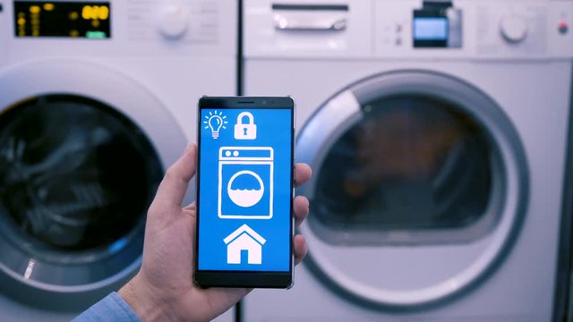 App on mobile phone controls washing machine in smart home