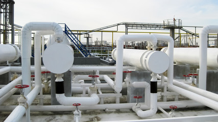 Heat exchangers in a refinery. The equipment for oil refining