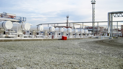 Fototapeta na wymiar Heat exchangers in a refinery. The equipment for oil refining