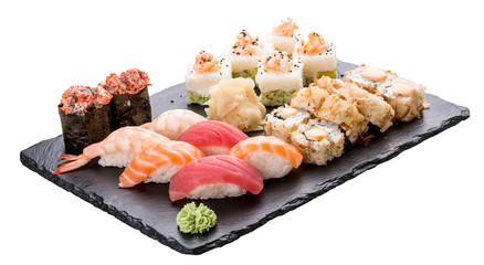 Sushi set on ceramic boards. On white background