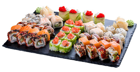 Sushi set on ceramic boards. On white background
