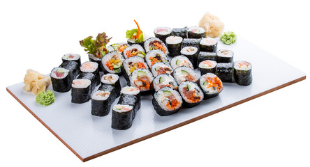 Sushi set on ceramic boards. On white background