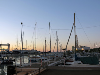 Yachts and fishing boats at the pier in the evening, Rimini,Italy.