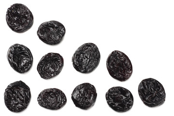 Dried plums - prunes isolated on white background. top view