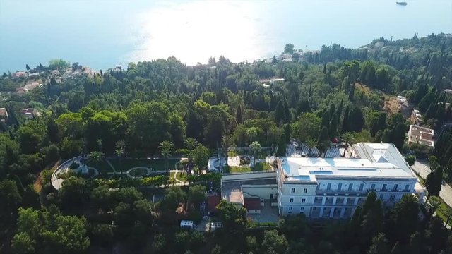 Aerial drone video of iconic Palace of Achileion former residence Empress Elisabeth of Austria (known as 'Sissi') and Kaiser William II of Germany, Corfu, Greece
