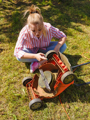Fototapeta premium Person having problem with land mower