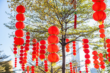 The tree is covered with red lanterns / Chinese New Year background material