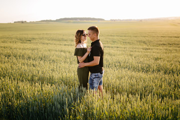 Portrait of a happy young couple enjoying a day in the park together