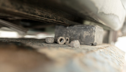 Bolts from the car in the workshop