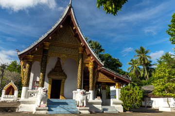 Fototapeta premium Luang Prabang, Laos – December 14, 2018: Beautiful buddhist temple in Luang Prabang old town, former capital of Laos and now a UNESCO World Heritage city.