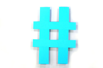 Obraz premium Hashtag paper sign on a white background.