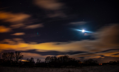 Obraz na płótnie Canvas Moon and clouds winter