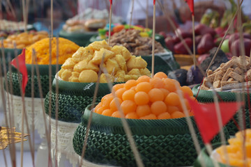 Sacrificial Offering food for 250th anniversary the King Taksin the Great. Colorful food and many different kind of desserts on a table 