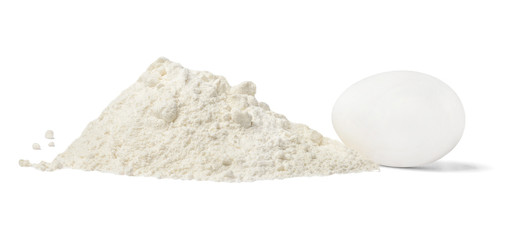 Wheat Flour Hill and Chicken Egg on white isolated background