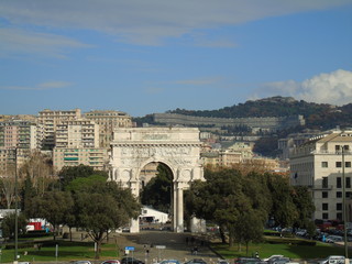  An amazing views of the pld station of Genoa in autumn with a great blue sky and some old parts of the city