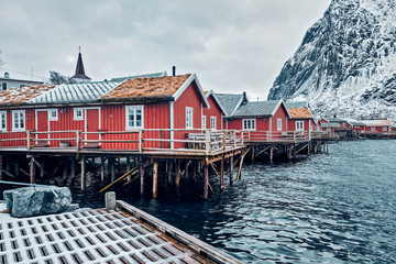 Fototapeta na wymiar Traditional red rorbu houses in Reine, Norway