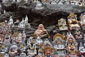 figures of gods near buddha temple in Asia