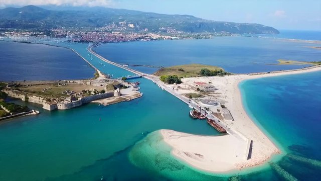 Aerial drone view video of Lefkada Canal a natural entrance to the island with swamp like landscape near castle of Agia Mavra, Ionian, Greece
